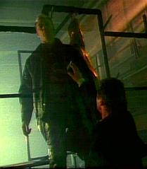 LaCroix hangs from a metal spike - far from dead