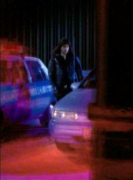 Divia spies on Vachon in the car park