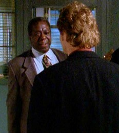 Back at the station, Nick talks to Reese about the case.