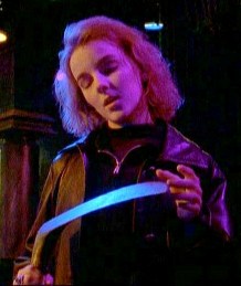 Divia fingers the sickle she intends to use to behead LaCroix