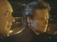 two-shot of LaCroix and Nick as they burn Divia's body